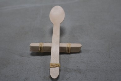 Attach a wooden takeaway spoon